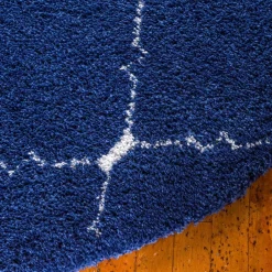 Pharao24 Blauer Langflor Teppich Russell><noscript><img width=